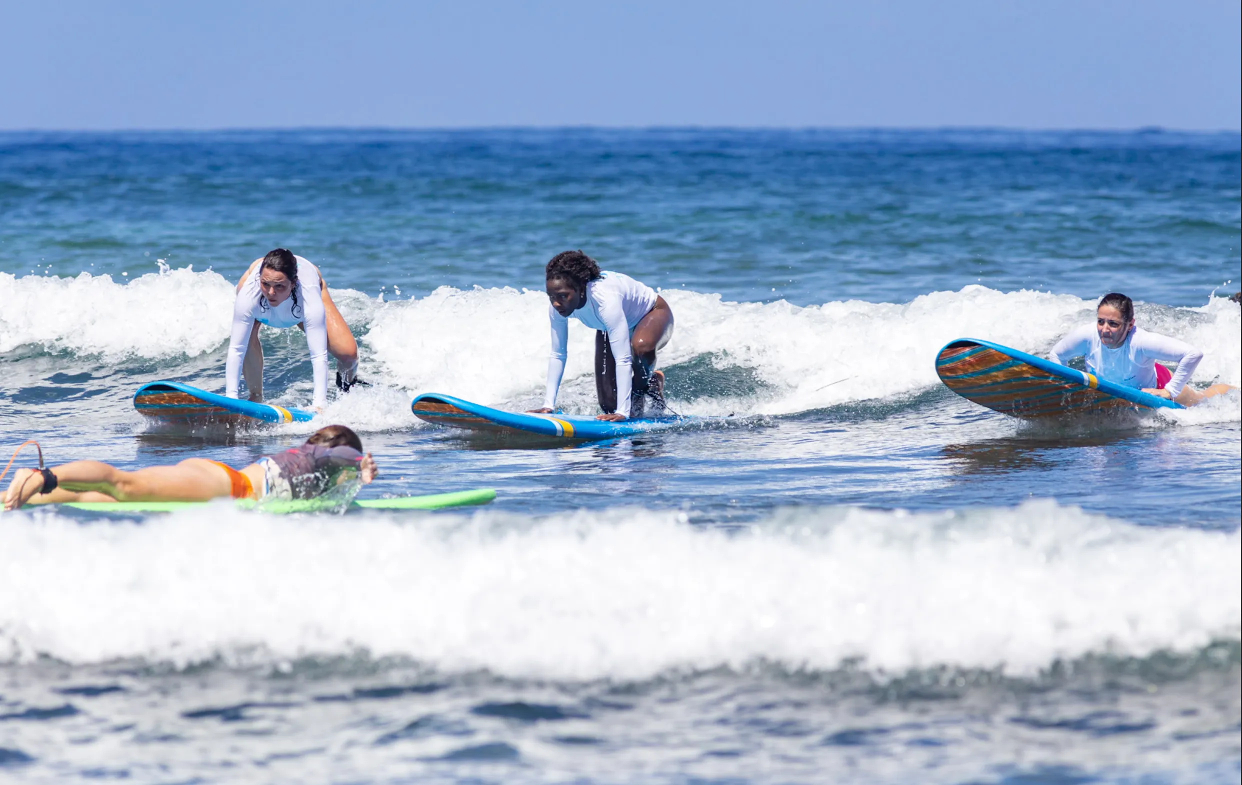 Cours collectif avec Zourit école de surf à La Réunion